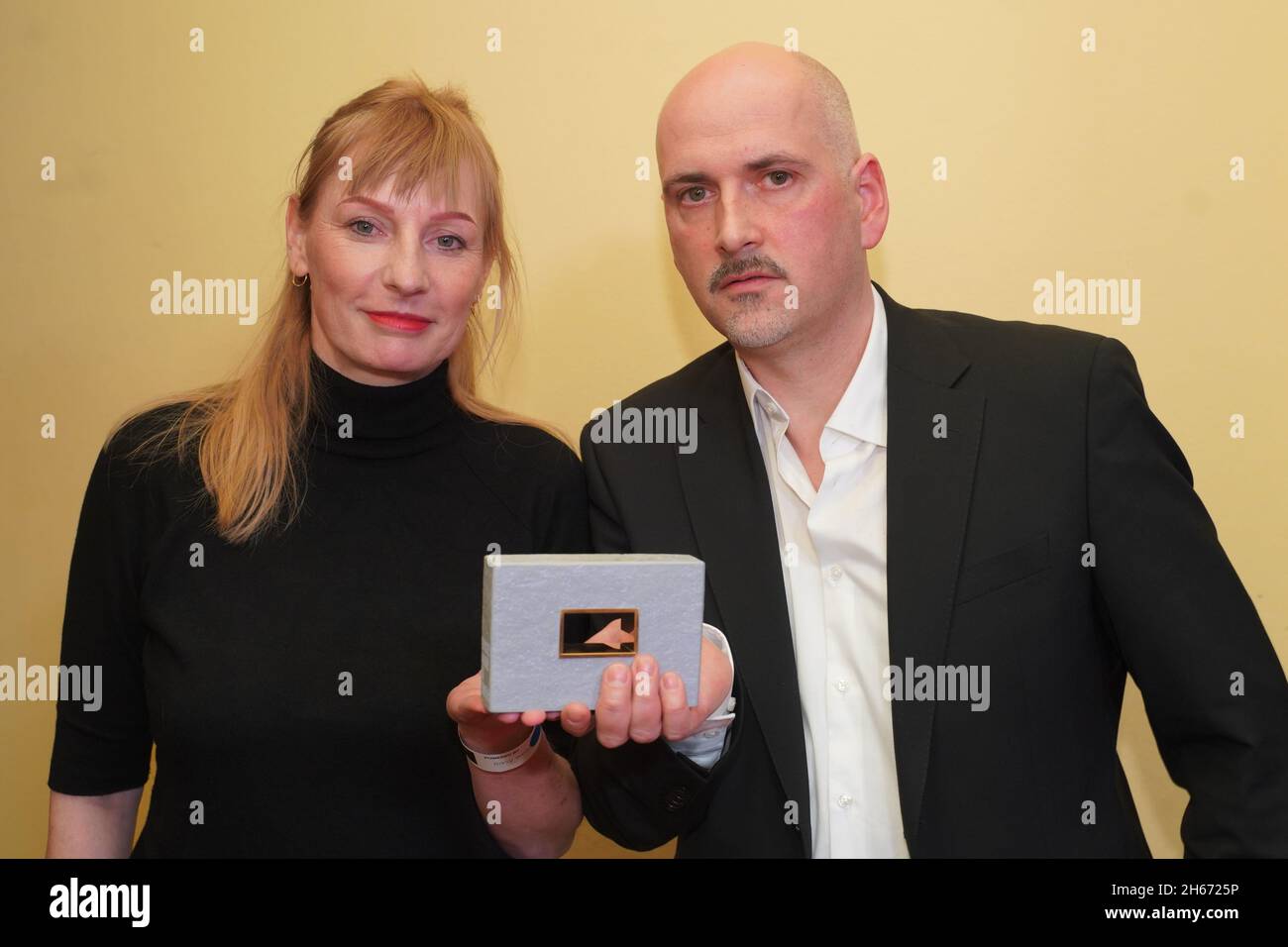 Berlin, Germany. 13th Nov, 2021. Julia Karg and Kai Minierski receive an award in the category 'Film Editing' at the DAfF (German Academy for Television) awards ceremony at the Babylon cinema. Credit: Jörg Carstensen/dpa/Alamy Live News Stock Photo