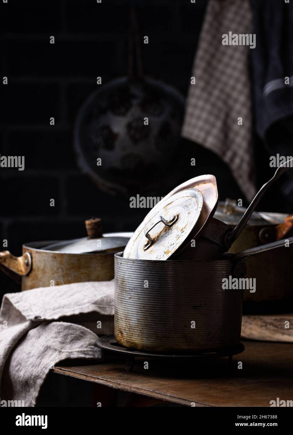 Old vintage iron pots and metallic dish Stock Photo Alamy
