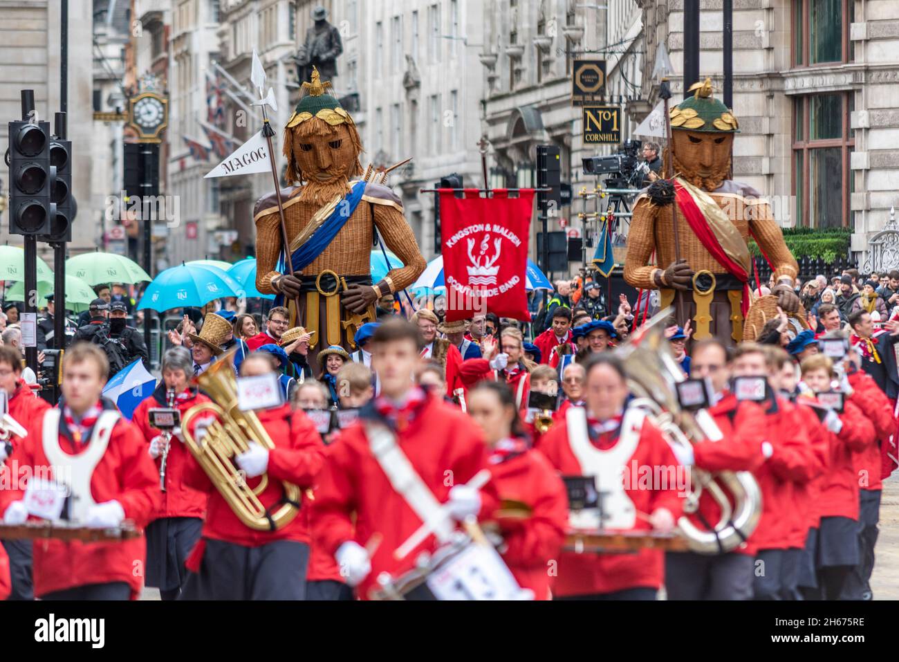GOG & MAGOG, with GUILD OF YOUNG FREEMEN at the Lord Mayor's Show, Parade, procession passing along Poultry, near Mansion House, London, UK. City Stock Photo