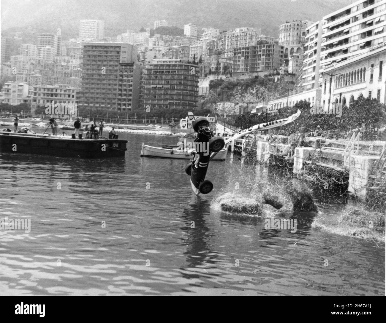 On Set Location Candid Filming Racing Car Crash In Monaco From Barge For Grand Prix 1966 Director John Frankenheimer Screen Story Screenplay Robert Alan Aurthur Music Maurice Jarre Douglas And Lewis Productions Joel Productions John Frankenheimer Productions Inc Cherokee Productions Metro Goldwyn Mayer 2H67A1J