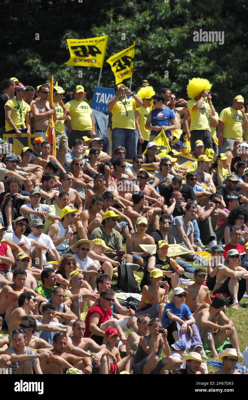 Mugello - Italy, May 31, 2009: Fans cheering Valentino Rossi during the 2009 MotoGP Italian Grand Prix. Stock Photo