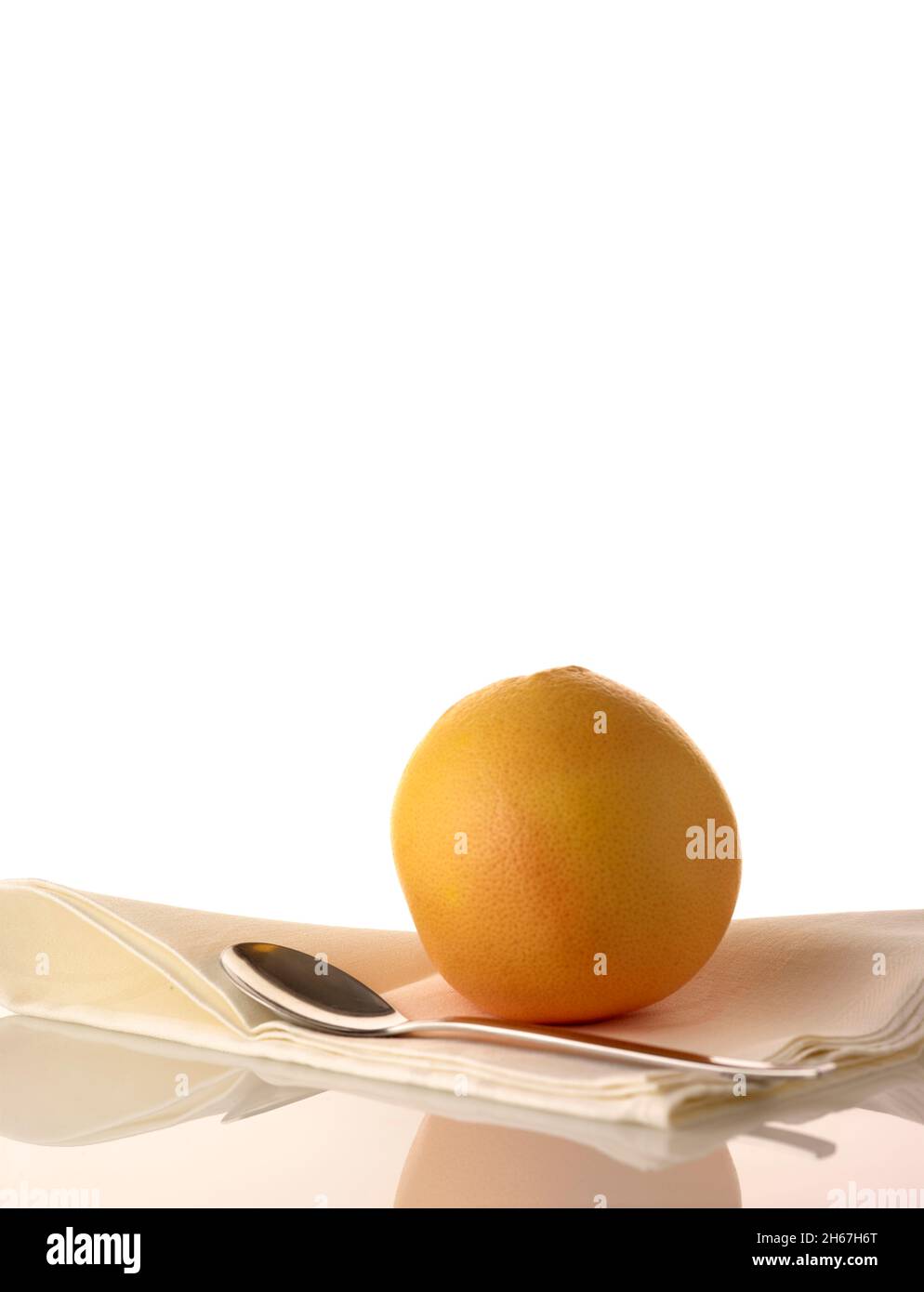 Healthy red Grapefruit food still-life against a plain background Stock Photo