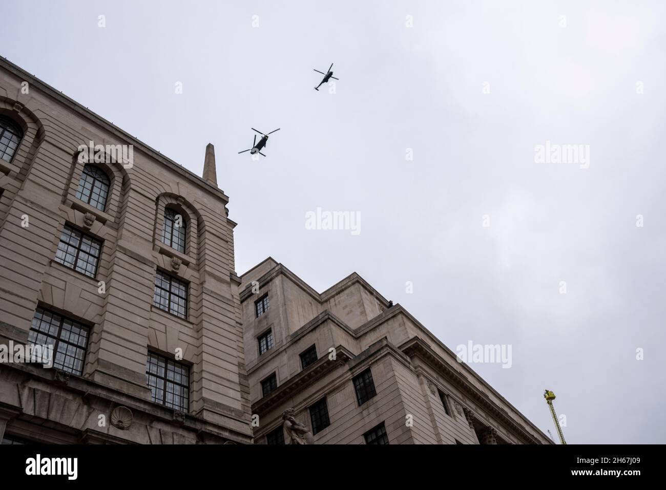 RAF Puma and Chinook helicopter flypast at the Lord Mayor's Show, Parade, procession passing along Poultry, near Mansion House, London, UK Stock Photo