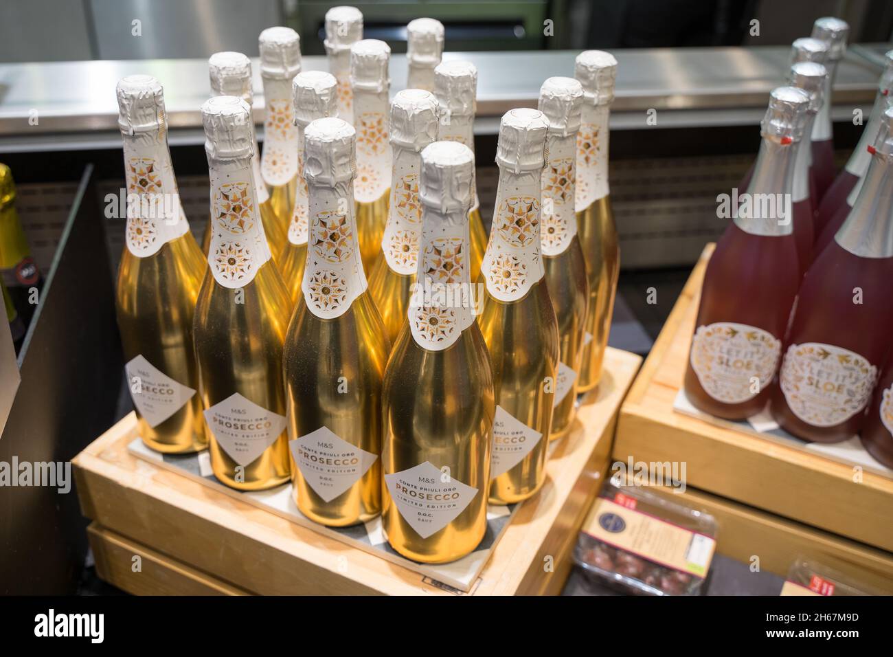 Conte Priuli oro Prosecco in golden bottles display on top of wine