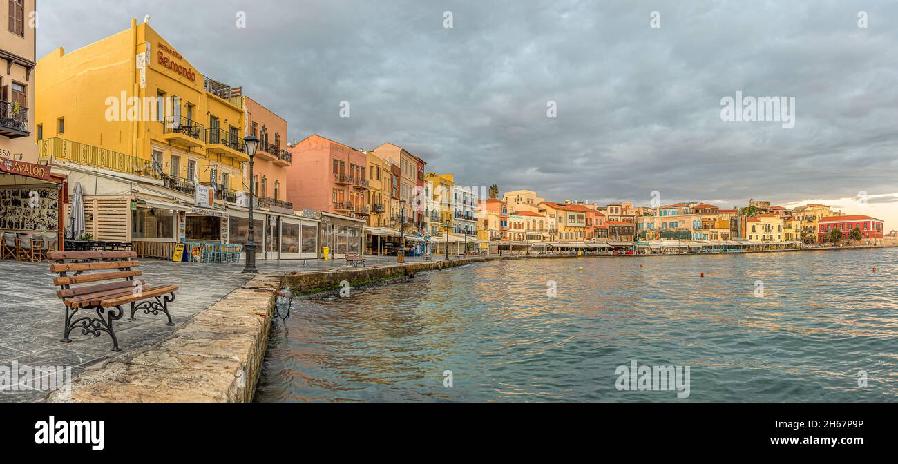 the glowing venetian harbour in Chania at the first soft morning light, Crete, Greece, October 13, 2021 Stock Photo