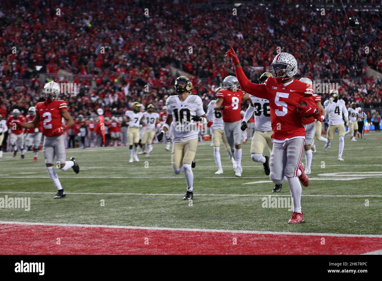Columbus, United States. 13th Nov, 2021. Ohio State Buckeyes Garrett Wilson (5) strolls into the endzone on a 51 yard run in the first half against the Purdue Boilermakers in Columbus, Ohio on Saturday, November 13, 2021. Photo by Aaron Josefczyk/UPI Credit: UPI/Alamy Live News Stock Photo