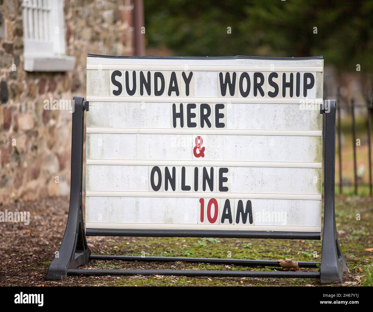 Sign in front of the historical Old Stone Church in Upper Saddle River, NJ Stock Photo