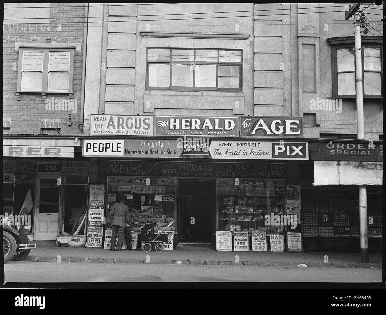JT & AT Stacey  Newsagents, 254 White Horse Road, Balwyn Victoria, July 1951, State Library of New South Wales, ACP Magazines Ltd. photographic archive, Series 004: Woman magazine negatives, 1936-1956, ON 388/Box 030/Item 228 https://collection.sl.nsw.gov.au/digital/Nok5DBVGzMdRb  The World Rebuilt by Peter Howard was published in 1951 is this photo from around June 1951 and not ca. 1938? WHAT ABOUT A WHALE STEAK? (11 July 1951). (1951-07-11). In The Australian woman's mirror. 27 (33)  Advertising (1952, December 24). The Argus (Melbourne, Vic. : 1848 - 1957), p. 12. Retrieved December 29, 202 Stock Photo