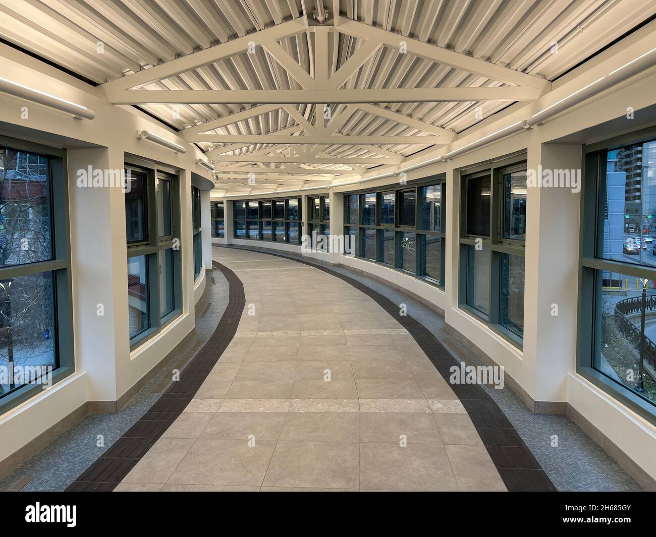 Calgary, Alberta,  Canada - November 13, 2021:Hallway in Calgary downtown plus 15. High-rise skyscraper complex with many offices. Stock Photo