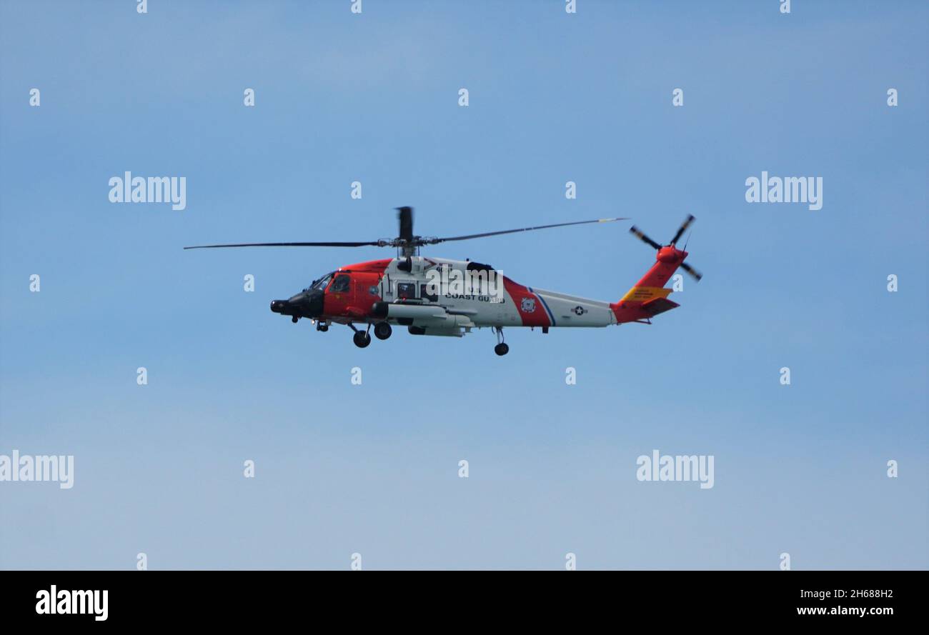 Madeira Beach, Florida, U.S.A - November 8, 2021 - The U.S Coast Guards helicopter on the sky Stock Photo