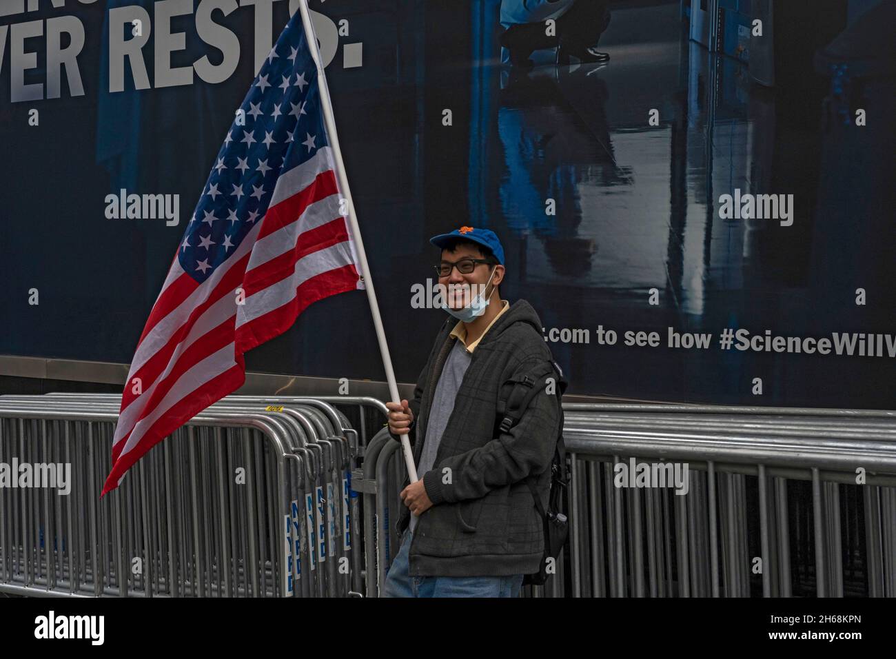 Pfizer Protest New York, United States. 13th Nov, 2021. A man waves the flag at ...