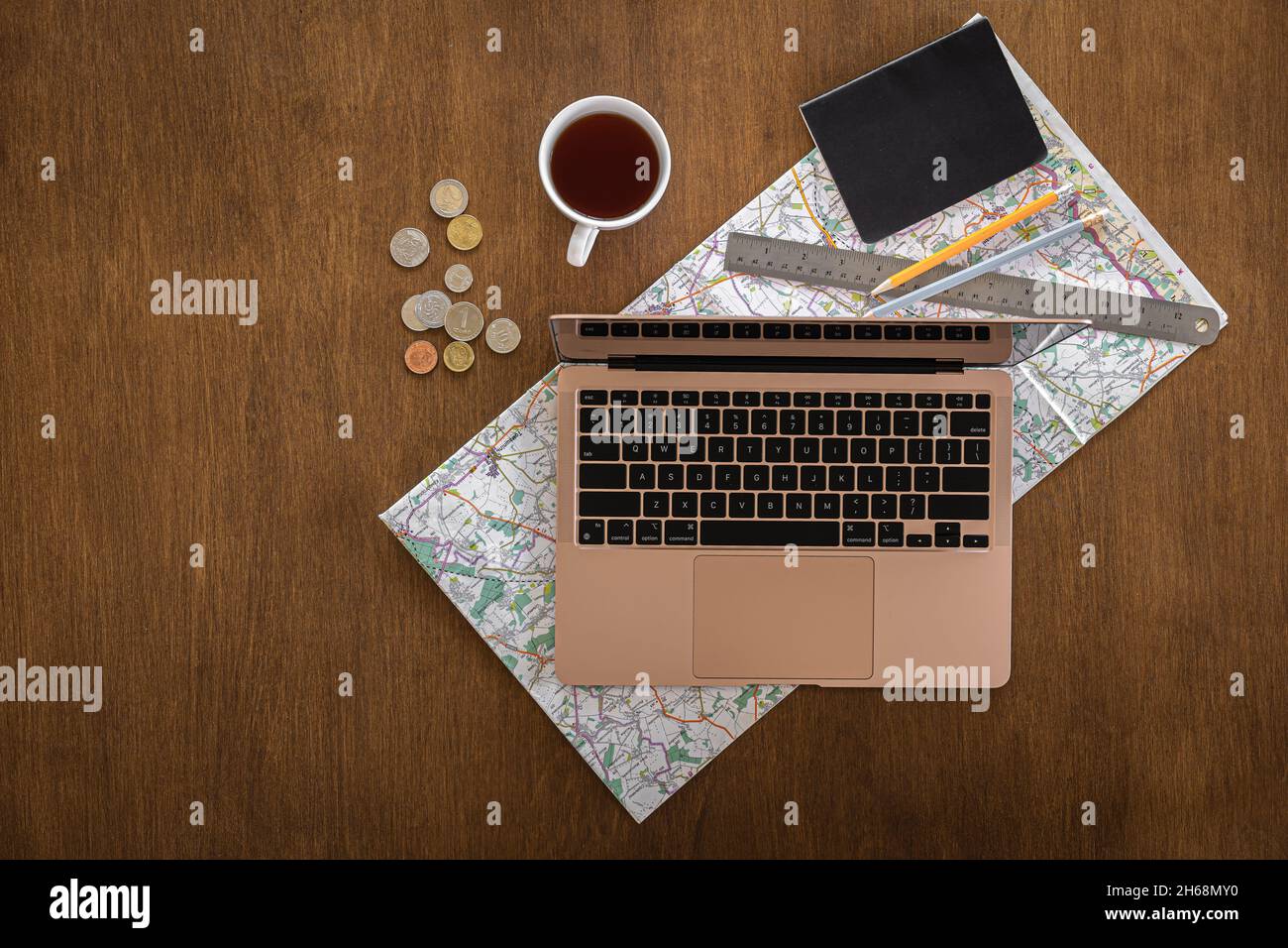 Planning a trip laptop map hi-res stock photography and images - Alamy