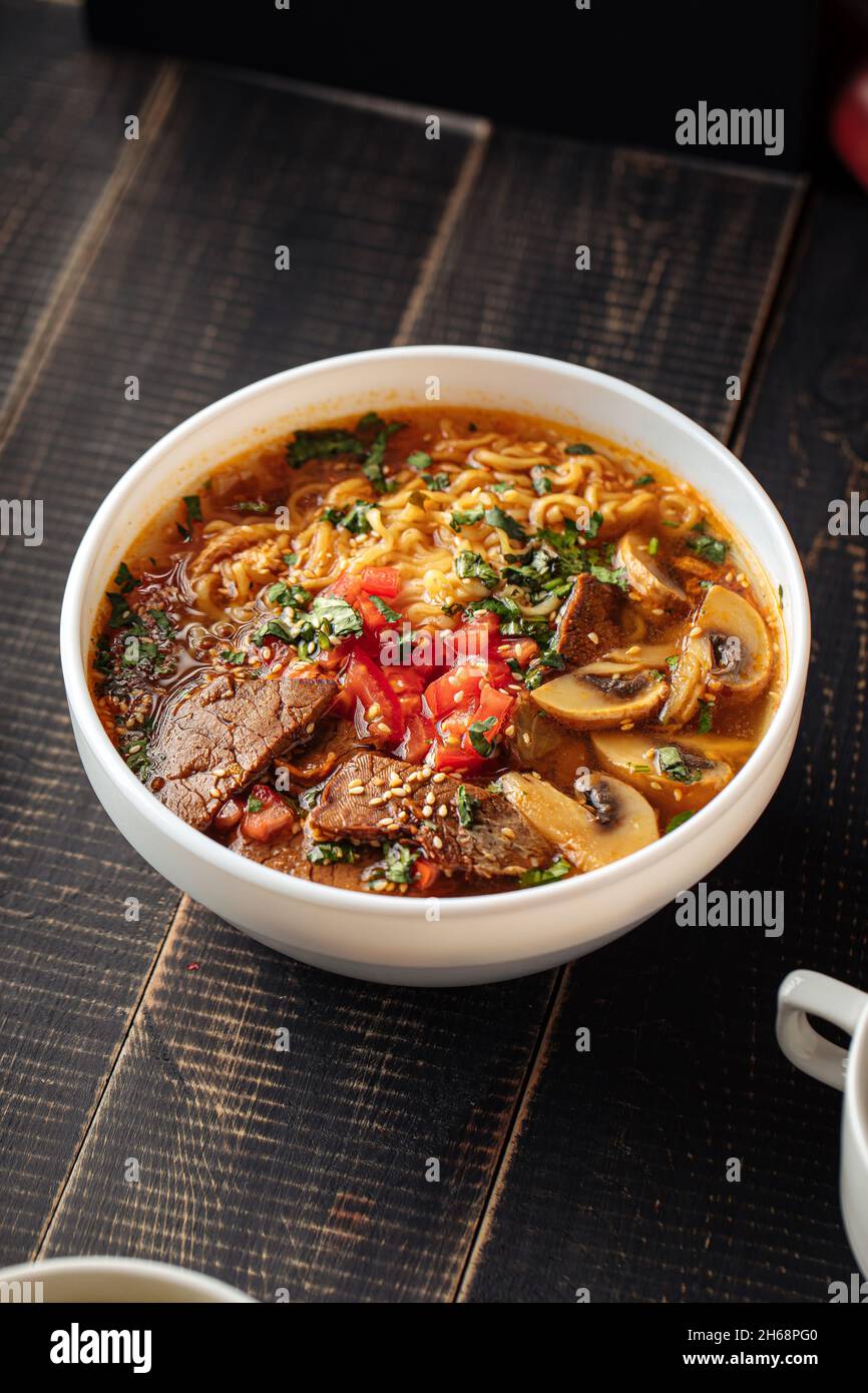 Korean beef ramen noodle soup with mushrooms Stock Photo Alamy