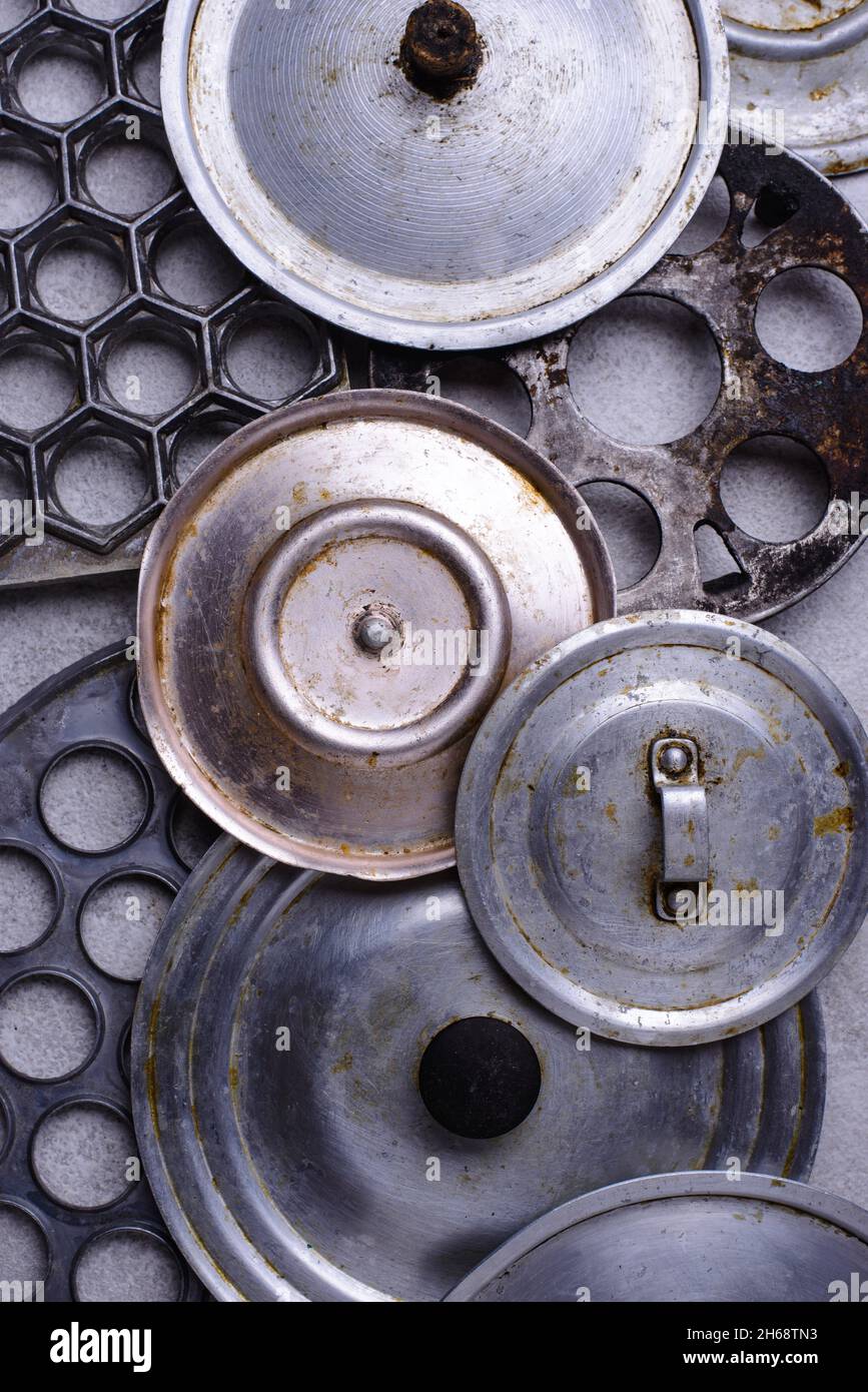 Old iron lids for vintage pot Stock Photo - Alamy