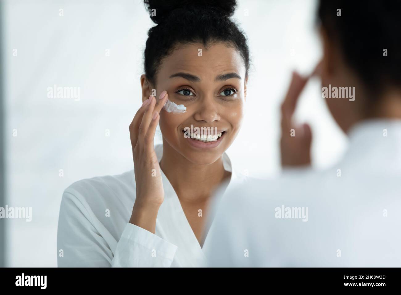 Beautiful young african woman hi-res stock photography and images - Alamy
