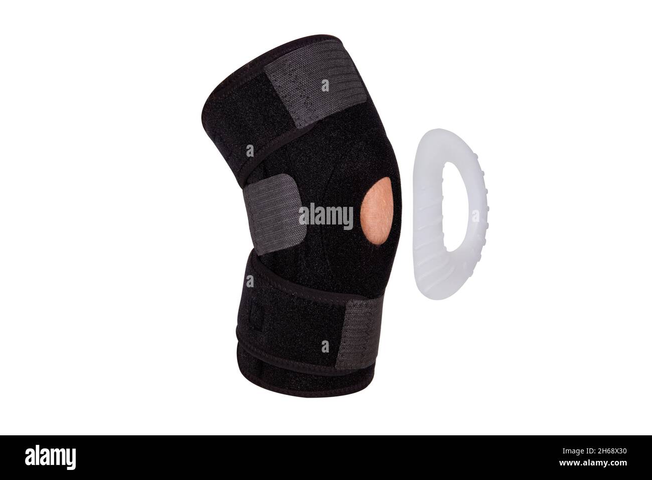 Knee Support Brace on leg isolated on white background. Orthopedic