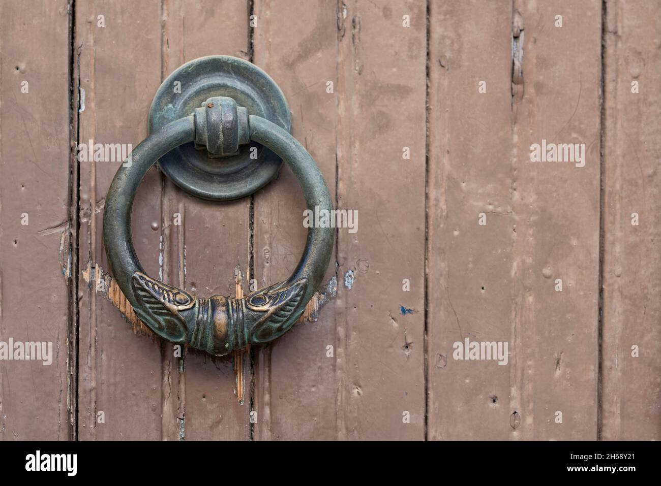 Traditional bronze knocker. Benavites. Comunitat Valenciana. Stock Photo