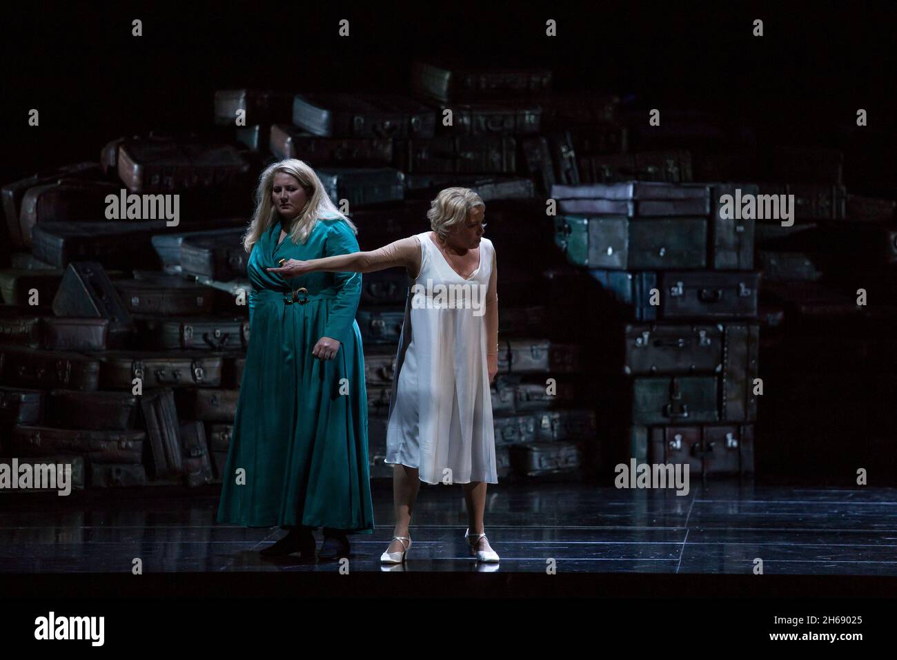 Berlin, Germany. 14th Oct, 2021. Karis Tucker (l) as Wellgunde and Nina Stemme as Brünnhilde stand on stage during a rehearsal for the Wagner opera 'Götterdämmerung' at the Deutsche Oper Berlin. Credit: Nina Hansch/dpa/Alamy Live News Stock Photo