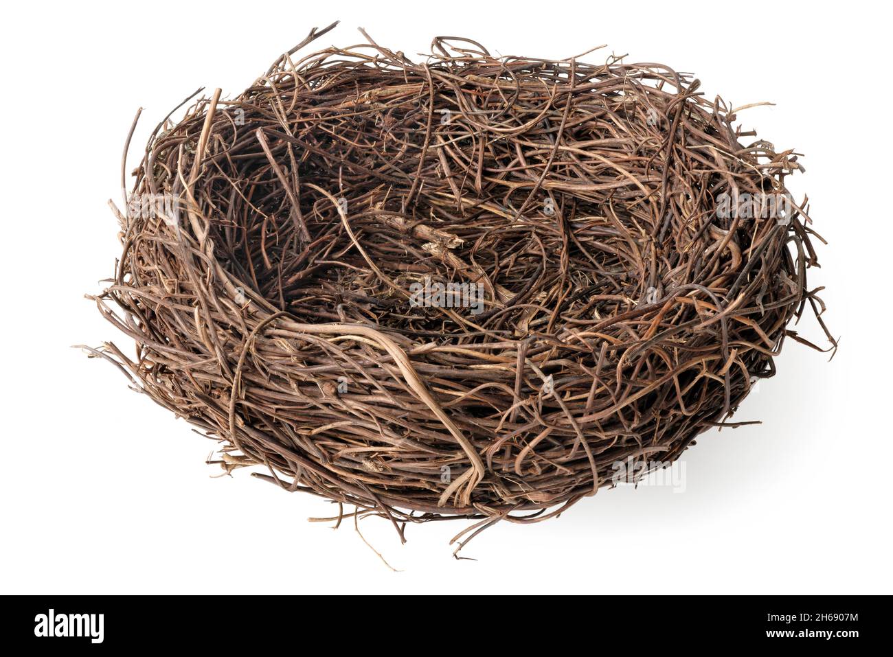 Isolated objects: empty birds nest, side view, on white background Stock Photo