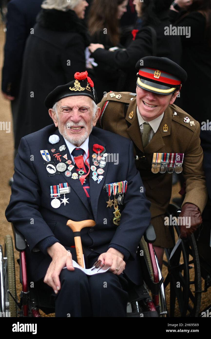 Veteran of D-Day, 98 year old Joe Cattini (left) forms up with veterans on Horse Guards Parade ahead of the Remembrance Sunday service at the Cenotaph, in Whitehall, London. Picture date: Sunday November 14, 2021. Stock Photo