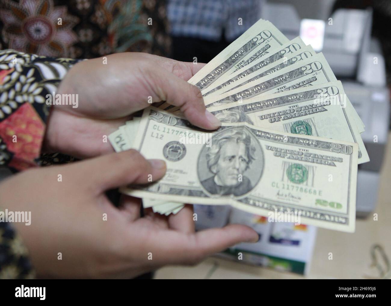 Hands holding some money Stock Photo