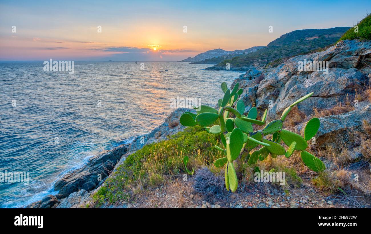 On the coast of the city of Roses there are not only beaches, but also very beautiful hiking trails. The sunsets are often stunning. Stock Photo