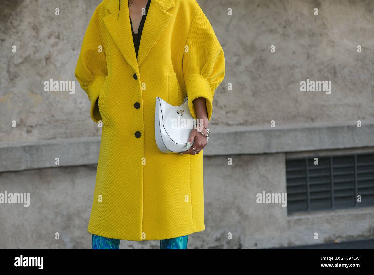 Milan, Italy - September 24, 2021: Street style outfit, two fashionable  women wearingpink oversized coat, checkered black white Chanel bag, heels  and Stock Photo - Alamy