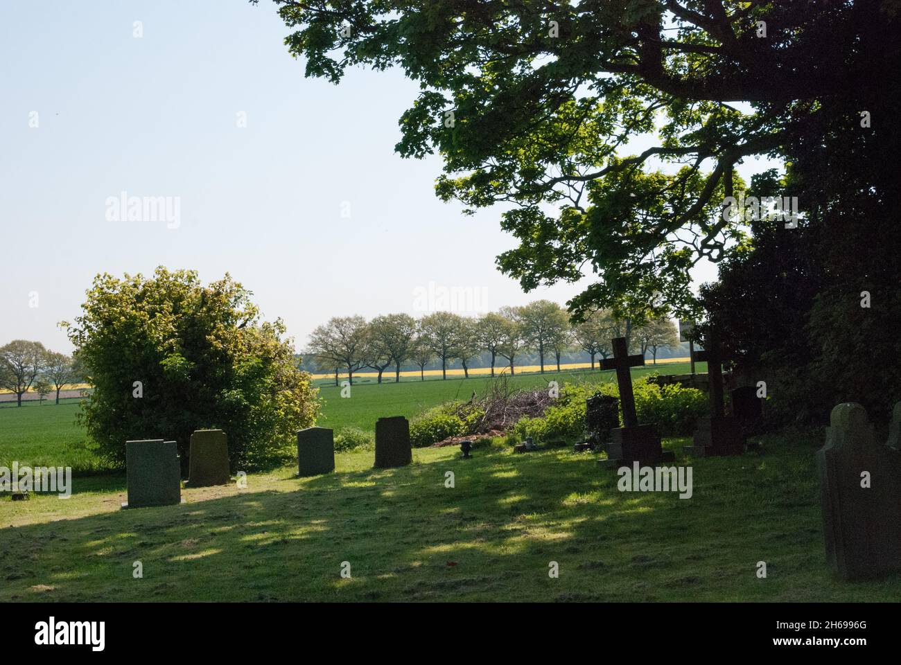 Memorial Cross Stone, Graveyard, Cemetery, Church Grounds, Graves, Burial Ground, Gravestones, Headstones, Gravestones, Countryside, Rural Stock Photo