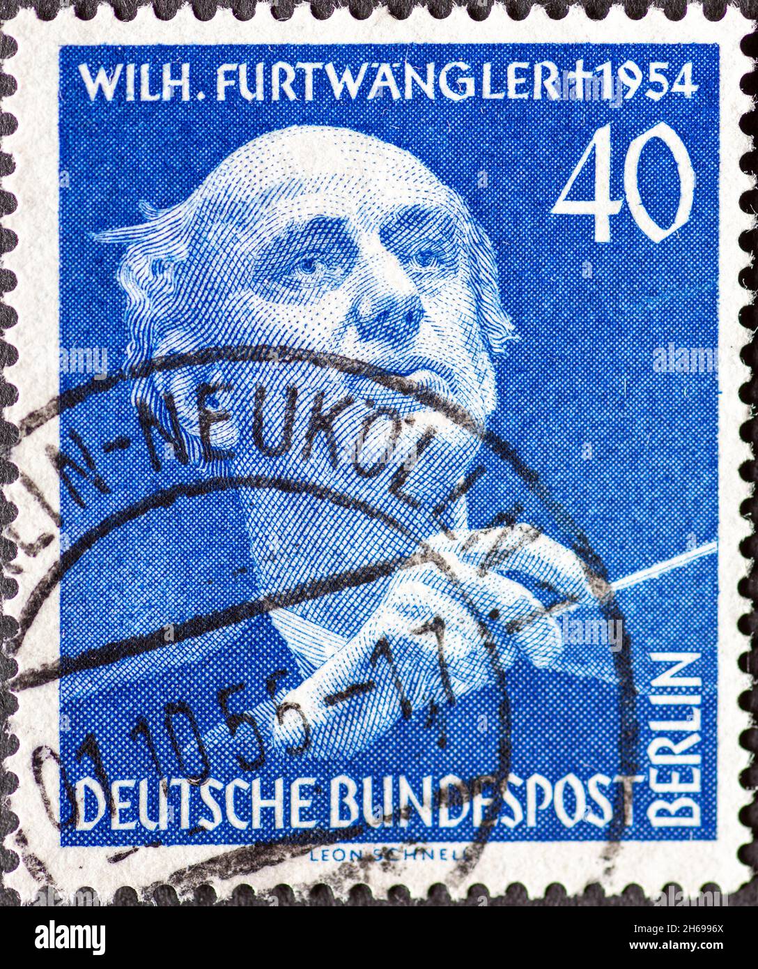 GERMANY, Berlin - CIRCA 1955: a postage stamp from Germany, Berlin showing Portrait of Wilhelm Furtwängler with baton. 1st anniversary of the death of Stock Photo