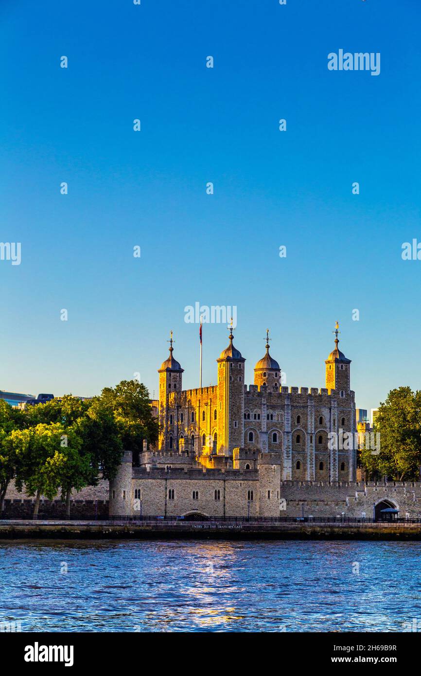 Tower of London as seen across the Thames river from London Bridge, London, UK Stock Photo