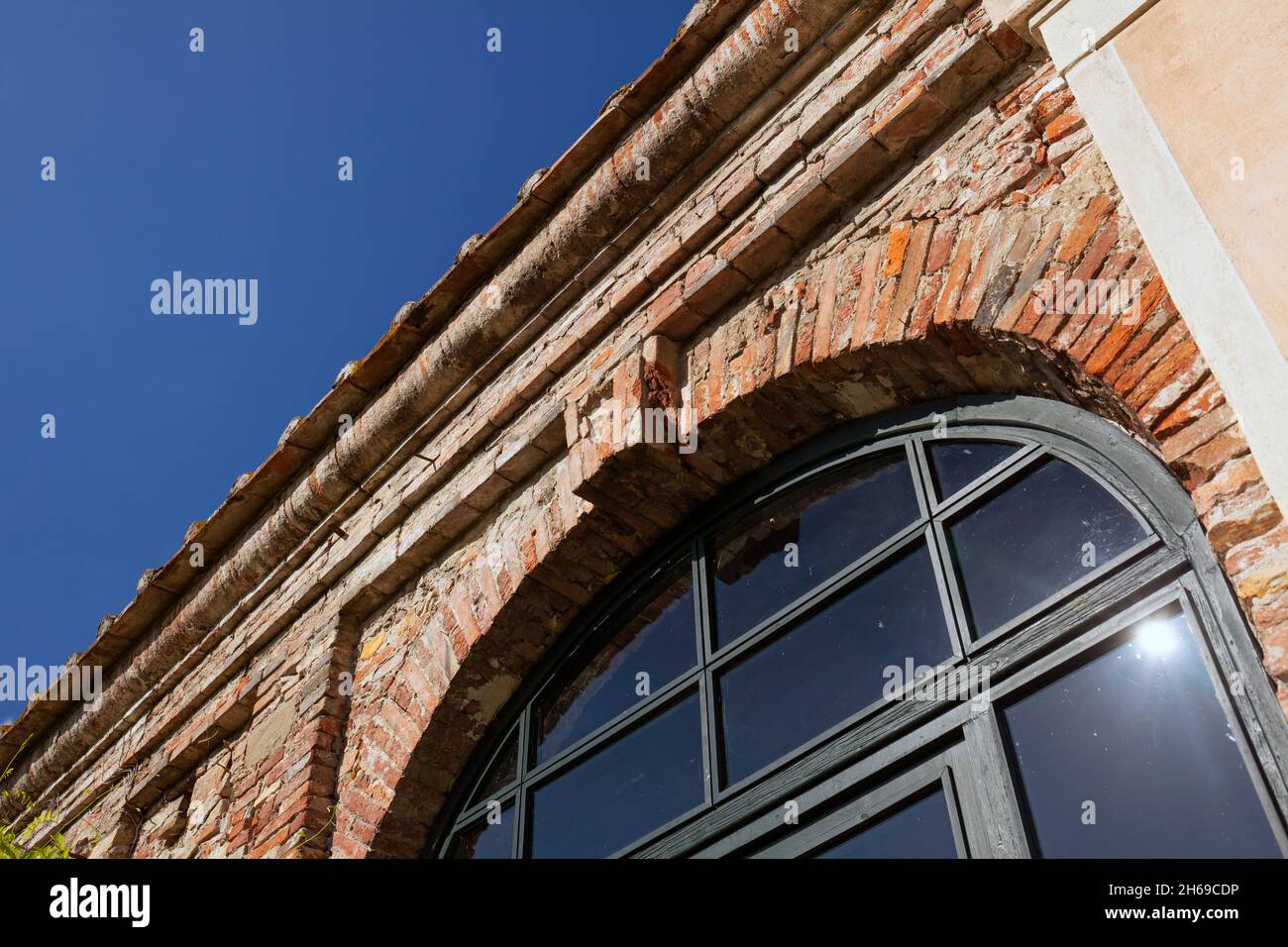 Europe, Italy, Tuscany, Lucca, Palazzo Pfanner showing Arched Window from Buildings along back Walls of the Gardens Stock Photo