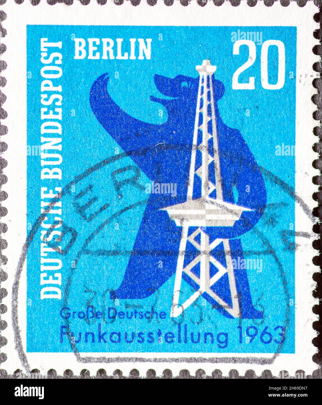 GERMANY, Berlin - CIRCA 1963: a postage stamp from Germany, Berlin showing the Berliner Bär with radio tower in the background. Large German radio exh Stock Photo