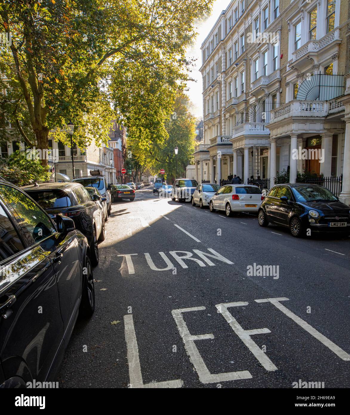 Keep left road markings in Collingham Rd, Kensington, London Stock