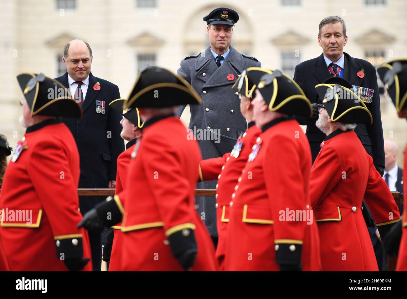 Defence Secretary Ben Wallace (left) and the Duke of Cambridge (centre) salutes veterans on Horse Guards Parade during the Remembrance Sunday service at the Cenotaph, in Whitehall, London. Picture date: Sunday November 14, 2021. Stock Photo