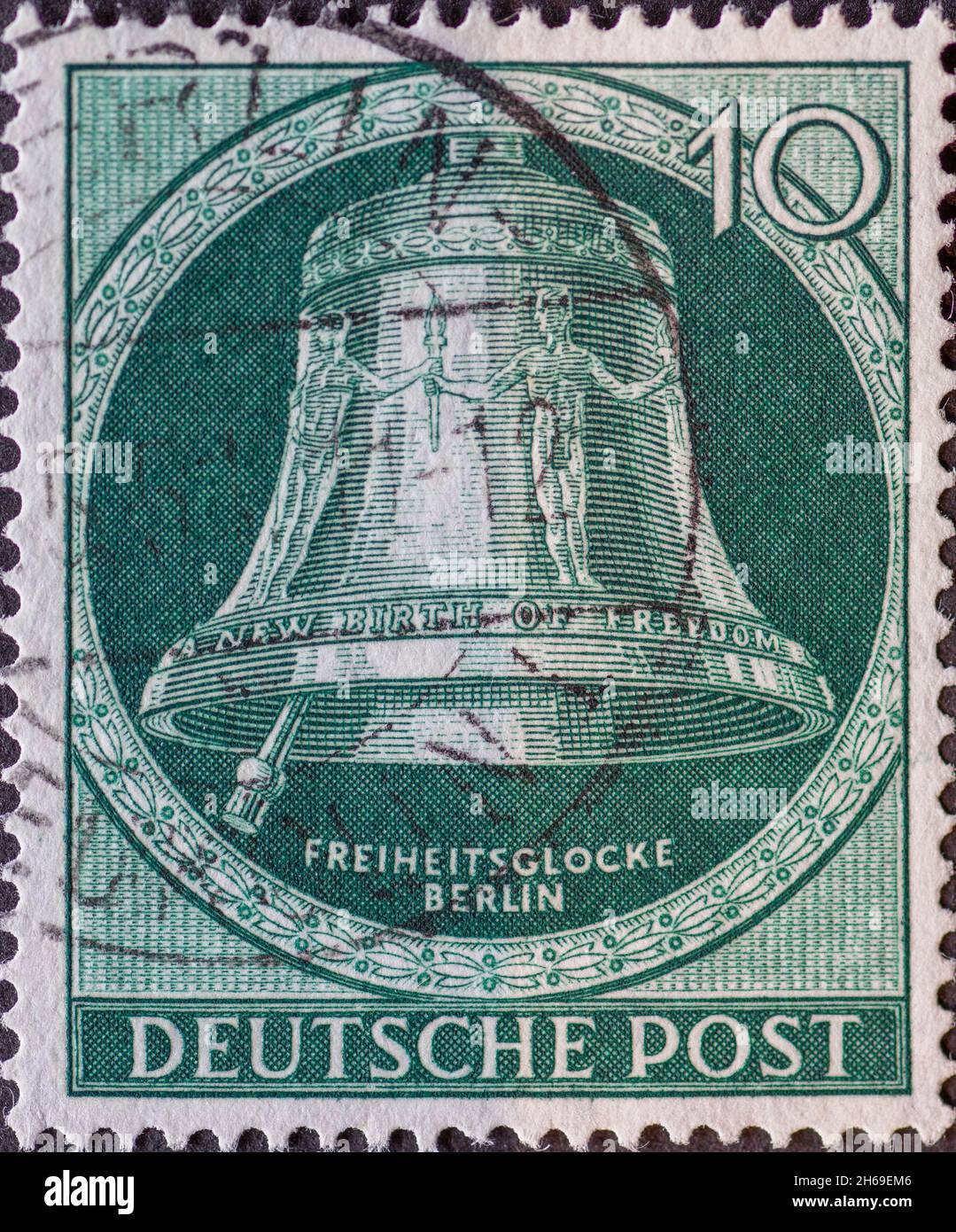 GERMANY, Berlin - CIRCA 1951: a postage stamp from Germany, Berlin showing the liberty bell with the text: New Birth of freedom. Clapper left. Color: Stock Photo