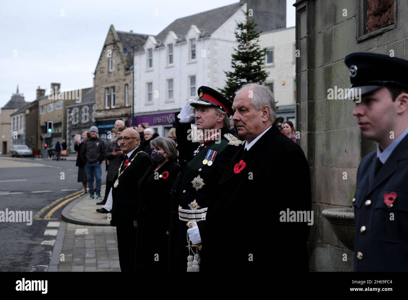 Selkirk, UK. 14th Nov, 2021. Selkirk, UK, Thursday 11 November 2021 . The Lord-Lieutenant for the areas of Roxburgh, Ettrick and Lauderdale, Richard Walter John Montagu Douglas Scott, 10th Duke of Buccleuch and 12th Duke of Queensberry, KT, KBE, CVO, DL, FSA, FRSE, FRSGS ltakes the Salute on behalf of Her Majesty The Queen after the parade leaves the War Memorial in the Royal Burgh of Selkirk. ( Credit: Rob Gray/Alamy Live News Stock Photo
