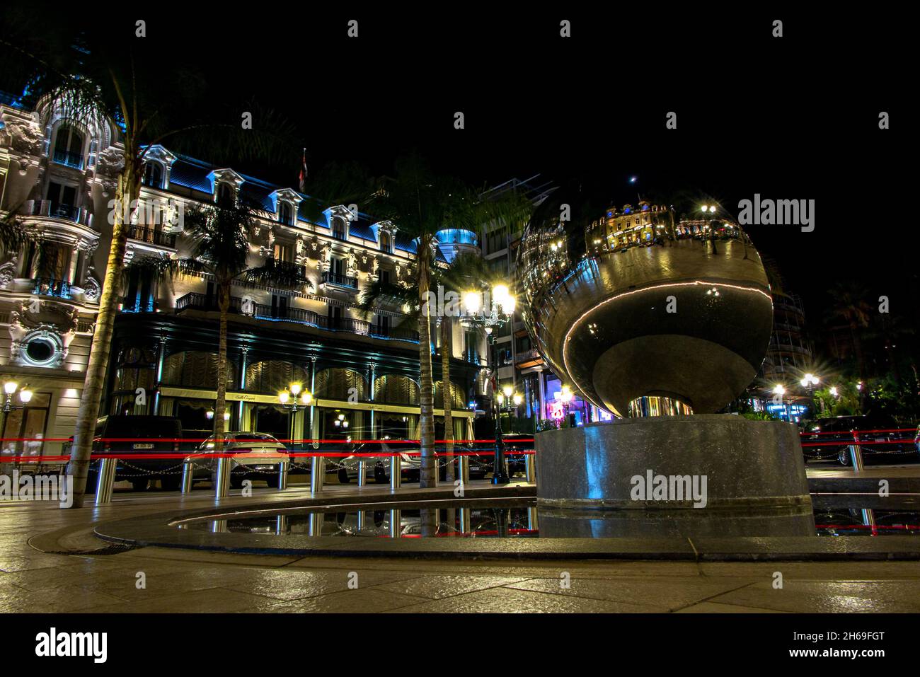 The famous Monte Carlo Cafe de Paris next to the Casino in Monaco at night Stock Photo