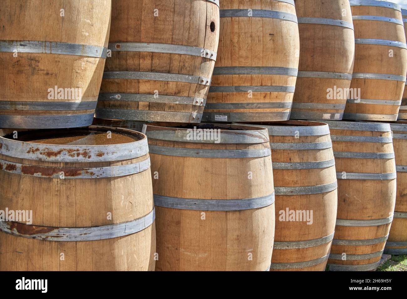 Closeup Wooden Wine barrels in a vineyard in Argentina. Horizontal. wine cellar and old winery Stock Photo