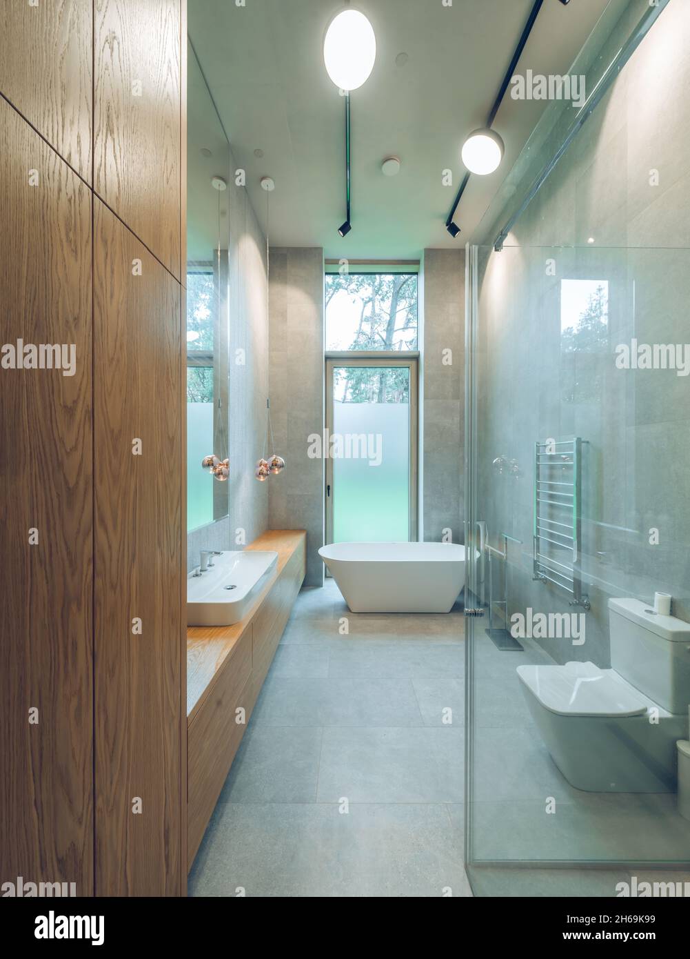 Image showcasing Modern interior of bathroom in luxury private house. White sink and ...