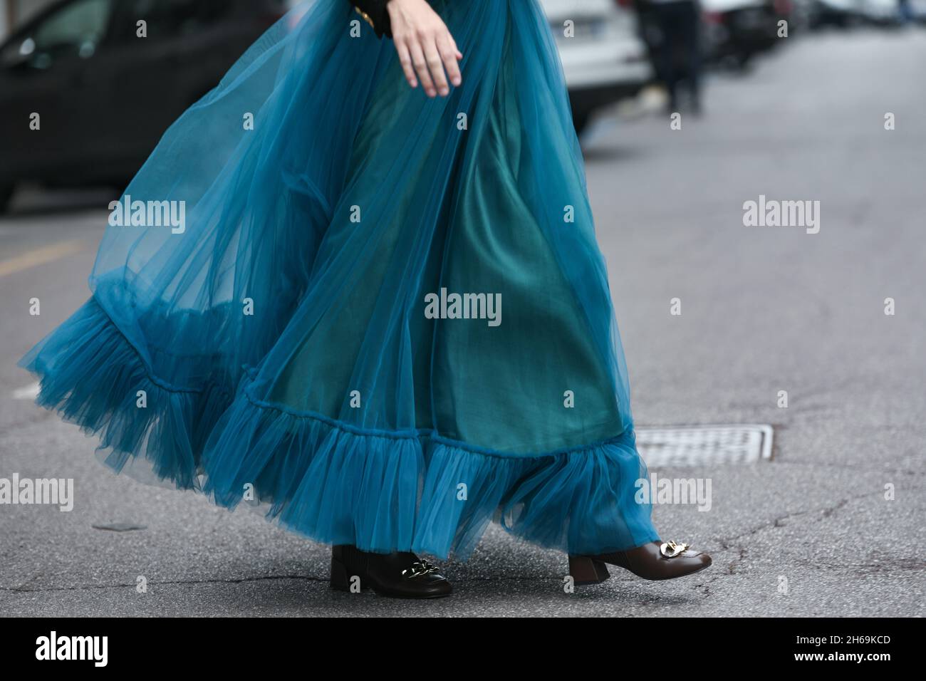 Milan, Italy - September 25, 2021:  Street style outfit, woman wearing a fashionable outfit on the streets of Milan, Italy. Stock Photo