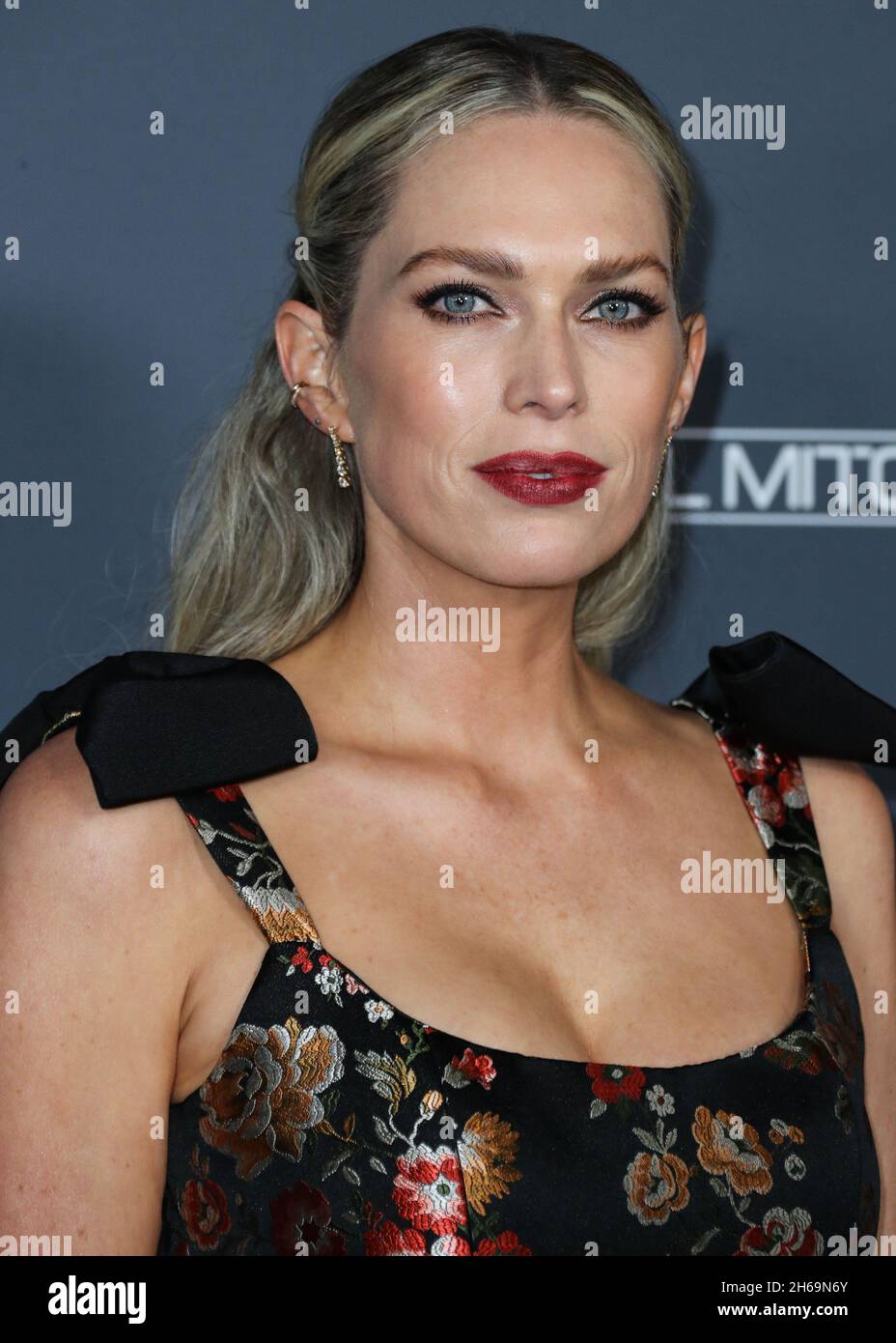 WEST HOLLYWOOD, LOS ANGELES, CALIFORNIA, USA NOVEMBER 13 Writer Erin Foster wearing a dress