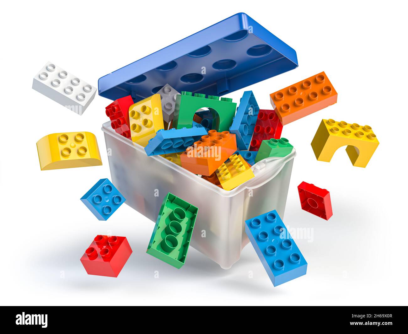 Box full of colorful toy plastic bricks and blocks isolated on white