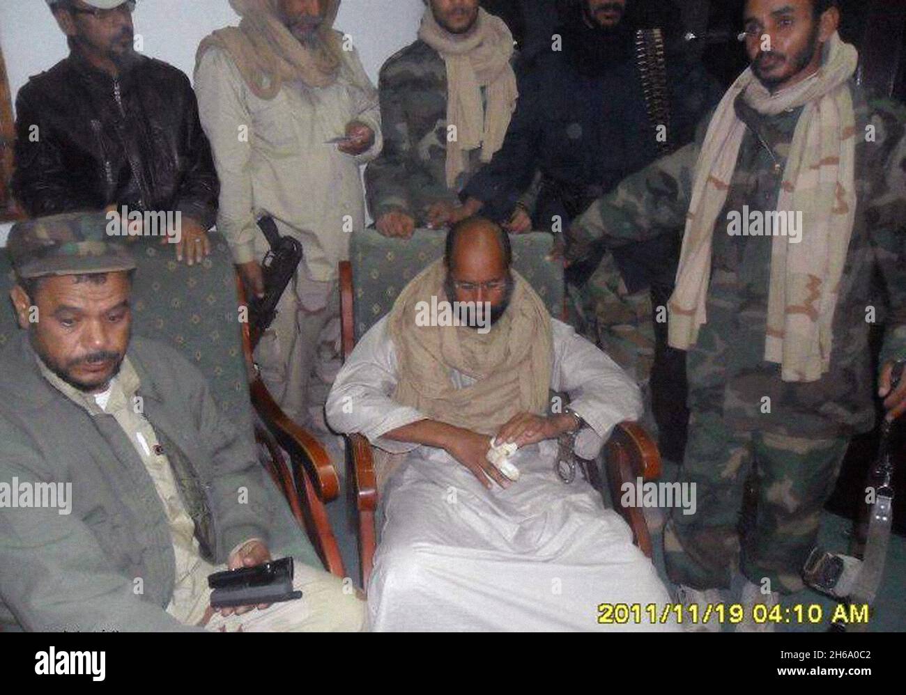 First images taken of former Libyan leader's son Saif Al Islam Gaddafi, as he was just captured by rebels of Abu Bakr brigade, near Sebha, Libya on November 19, 2011. Photo by Balkis Press/ABACAPRESS.COM Stock Photo