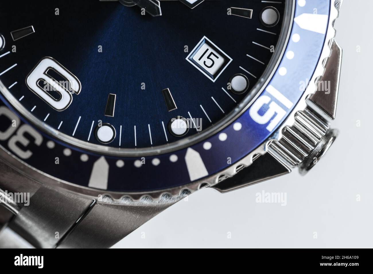 Swiss made automatic mechanical mans wrist watch fragment with blue deal, date indicator and