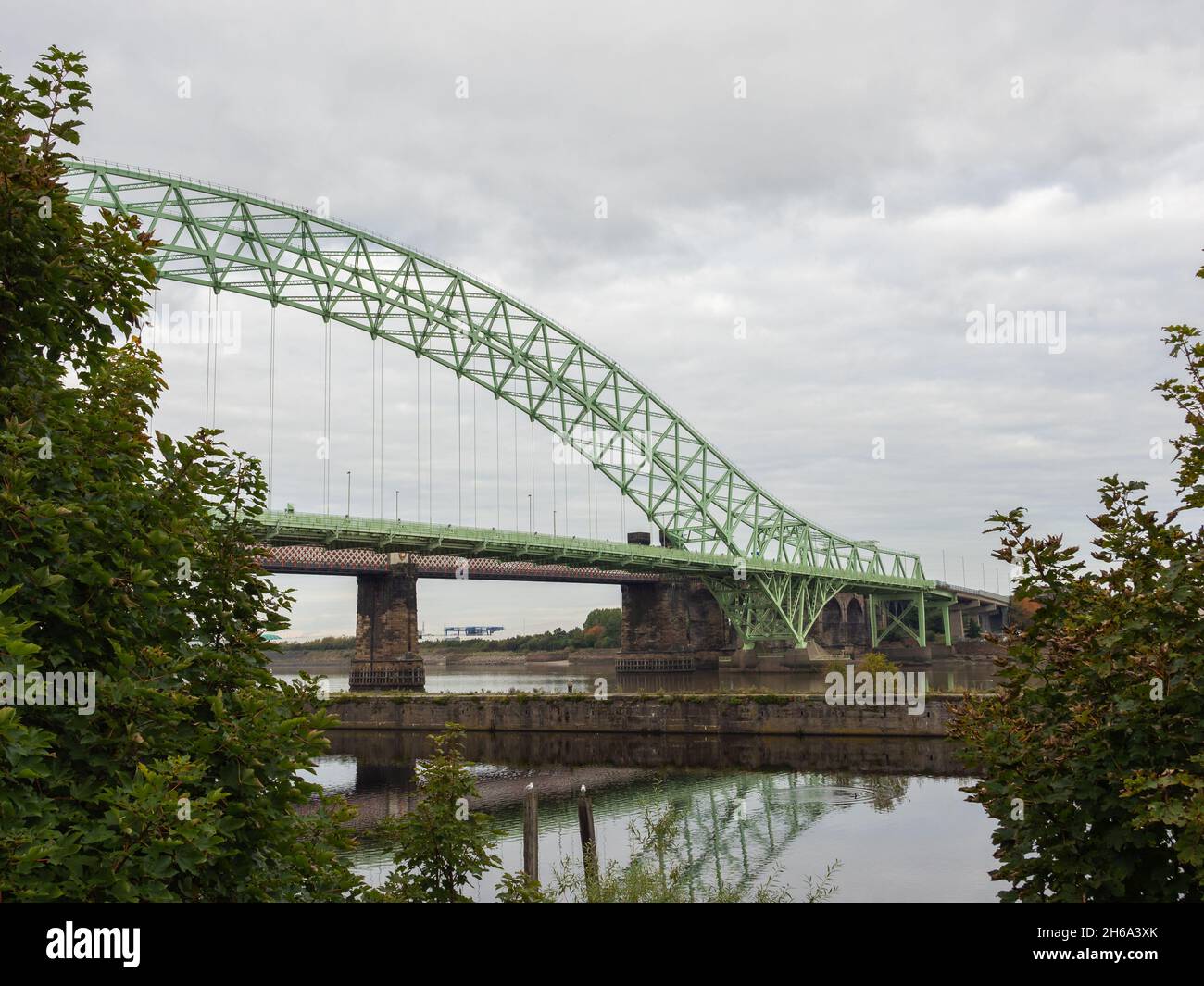 A Runcorn road bridge over the River Mersey and Manchester ship canal ...