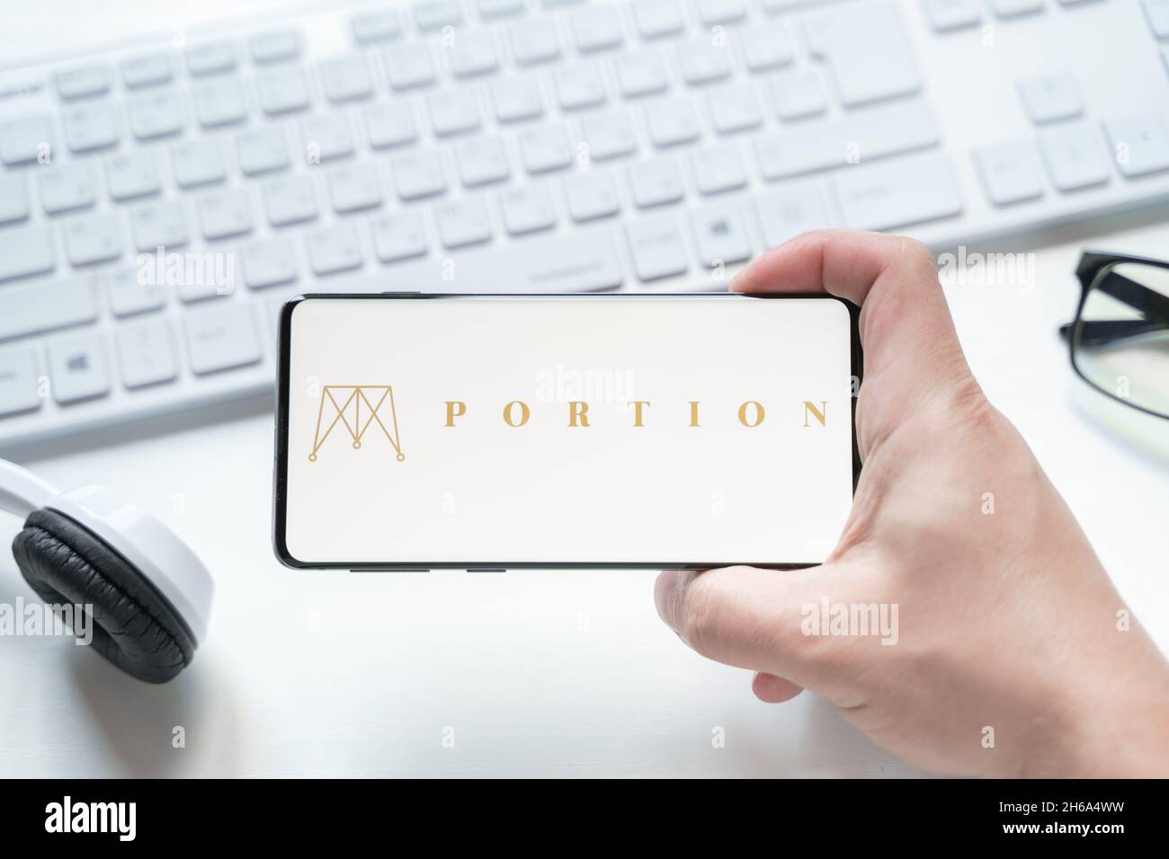 Russia Moscow 08.06.2021 Logo of Portion in mobile phone. Cryprocurrency  PRT token,crypto coin. Marketplace for design, digital,physical art,nft  colle Stock Photo - Alamy