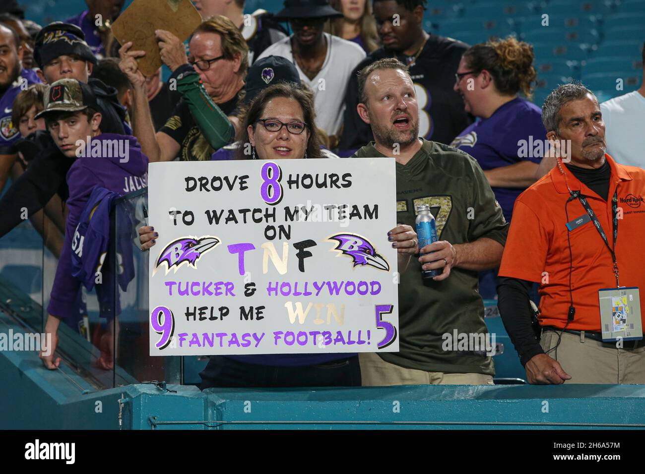 Thursday, November 11, 2021; Miami Gardens, FL USA; A Baltimore Ravens fan proudly shows her sign during an NFL game against the Miami Dolphins at Har Stock Photo