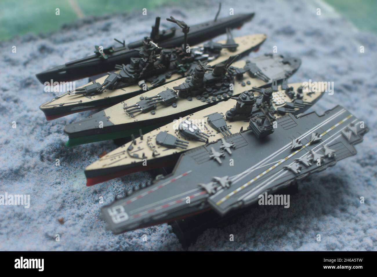 The lineup of miniature battleships consists of the enterprise carrier, the submarine, the battleship Musashi, the battleship Yamato, the main battles Stock Photo