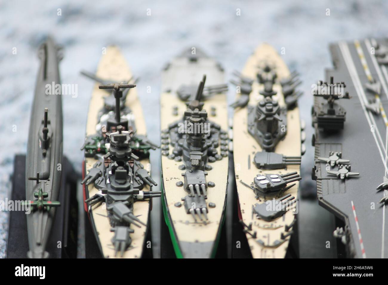 The lineup of miniature battleships consists of the enterprise carrier, the submarine, the battleship Musashi, the battleship Yamato, the main battles Stock Photo