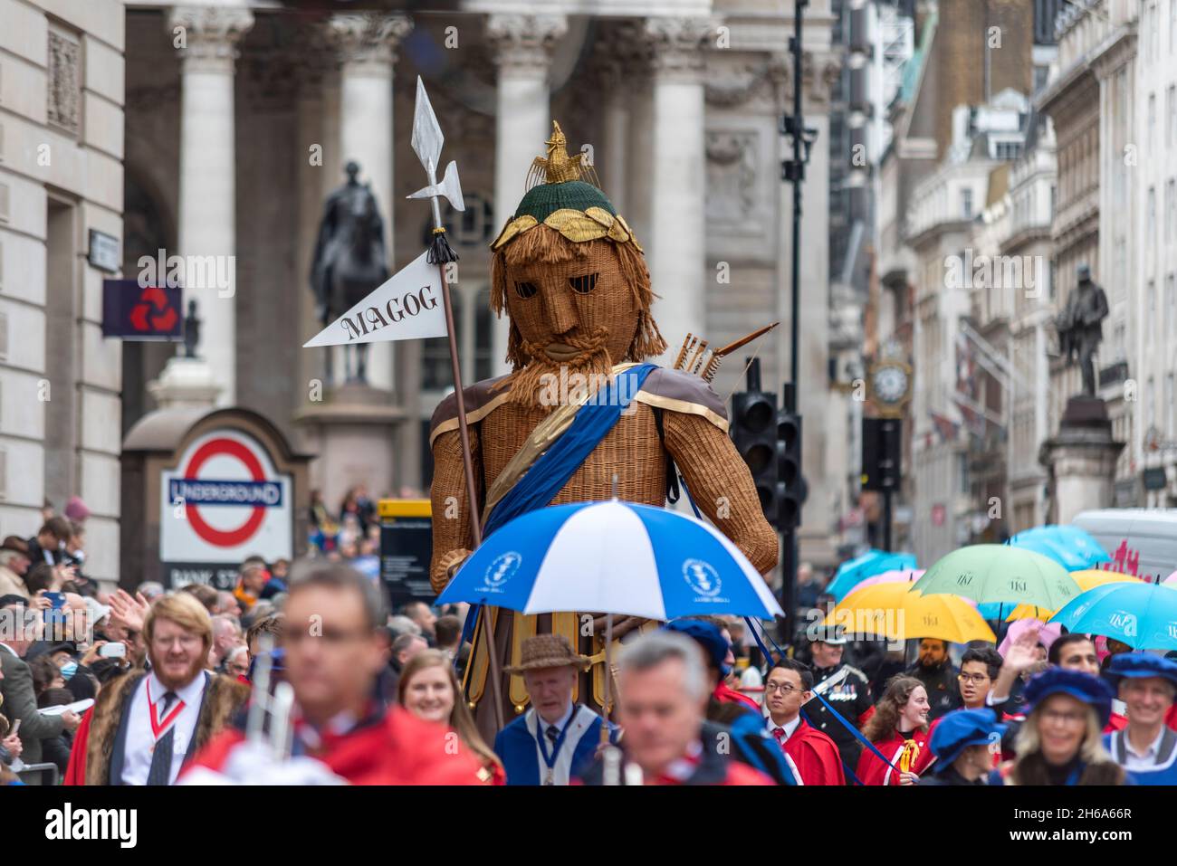 Magog giant effigy, with GUILD OF YOUNG FREEMEN at the Lord Mayor's Show, Parade, procession passing along Poultry, near Mansion House, London, UK Stock Photo